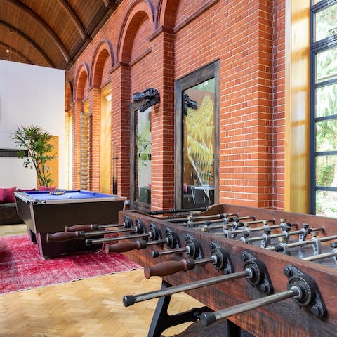 Get competitive with friends in style in the game room