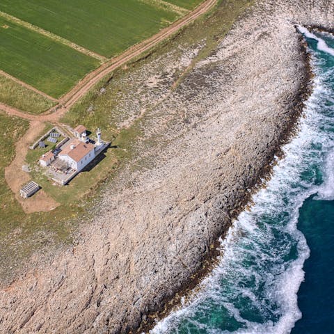 Stay on the edge of the Istrian Peninsula where the Adriatic Sea meets the rugged coast