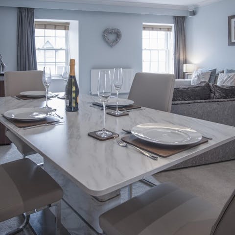 Share delicious meals at the elegant dining table