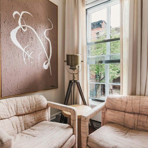 Curl up with a book or a cocktail on the cosy chairs