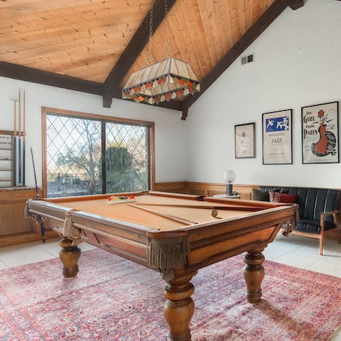 Challenge friends and family to a few games of pool