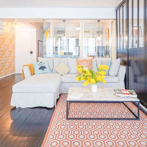 Sink into the plush corner sofa with a glass of pinot noir
