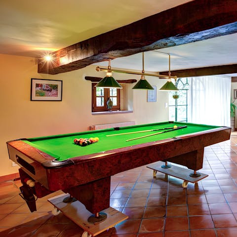 Enjoy shooting some pool in the games room