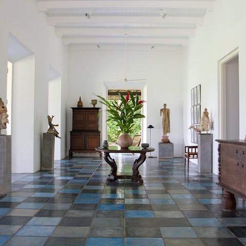 Study the home's various Sri Lankan curiosities