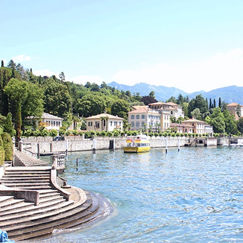 Book a boat trip on Lake Como and admire the scenery as you take to the water