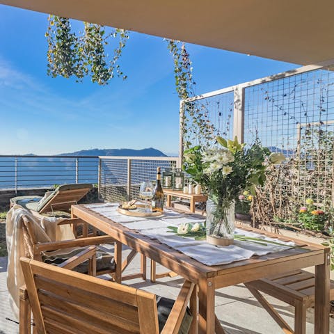 Enjoy an alfresco meal as the sun warms your skin