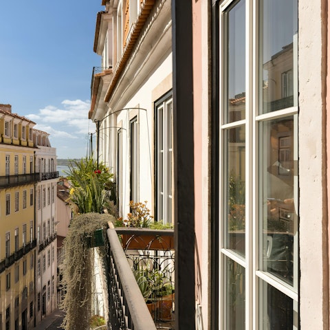 Catch a glimpse of the waterfront from the balcony