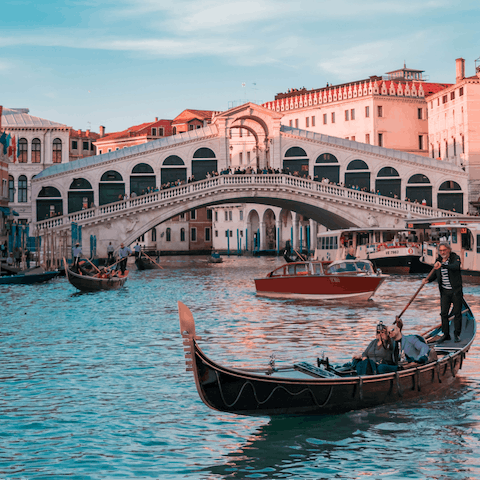 Visit the beautiful Rialto Bridge , just a ten–minute walk away