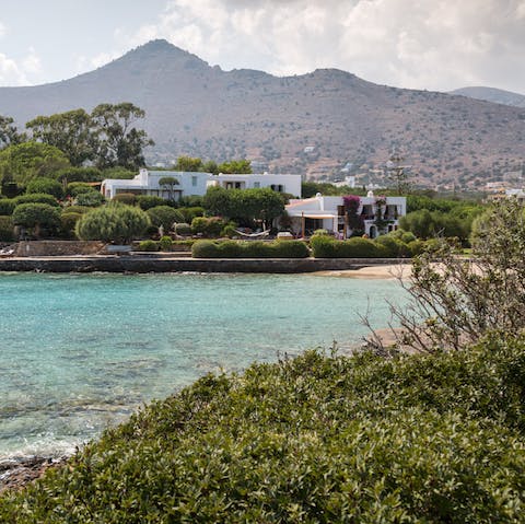 Stay right on the water, with stunning gardens and a mountain backdrop