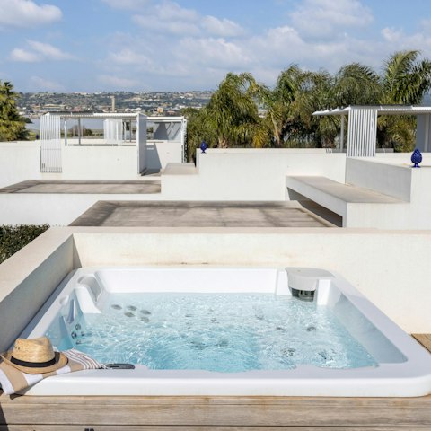 Enjoy a relaxing soak in the private hot tub