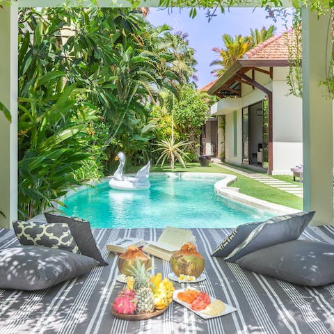 Float in the private pool or catch some sun on the daybed