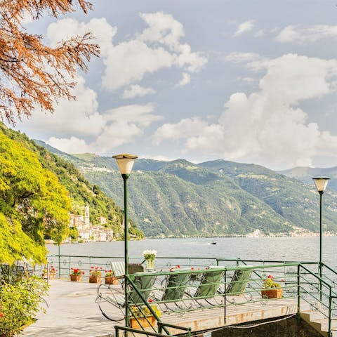 Enjoy spectacular views as you relax on the lakefront terrace