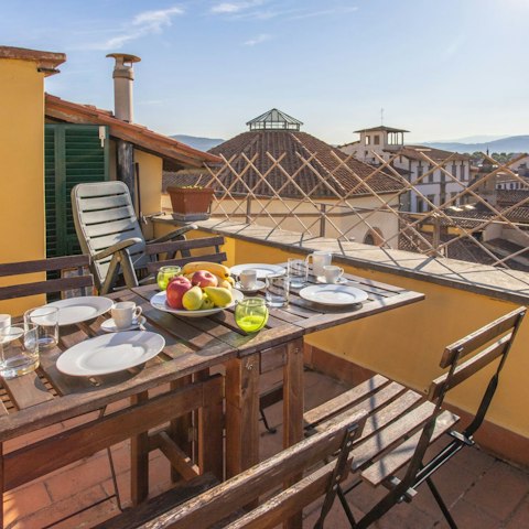 Start your days with Italian coffee and pastries on the balcony terrace