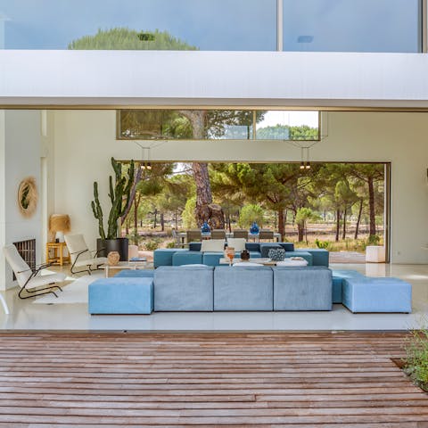 Open up the pocket doors and let the refreshing ocean breeze fill the home