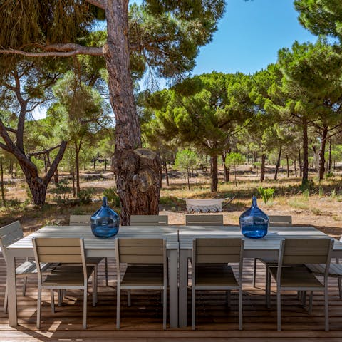 Enjoy alfresco dining on the patio, accompanied by the calming sounds of nature