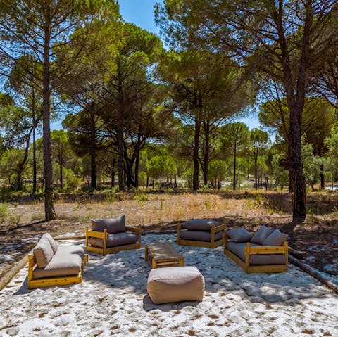 Sink your toes in the sand and chat away with friends