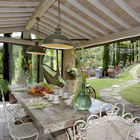 Wander down the garden path to the dining area for lunch