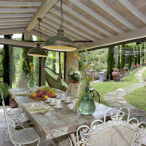 Wander down the garden path to the dining area for lunch