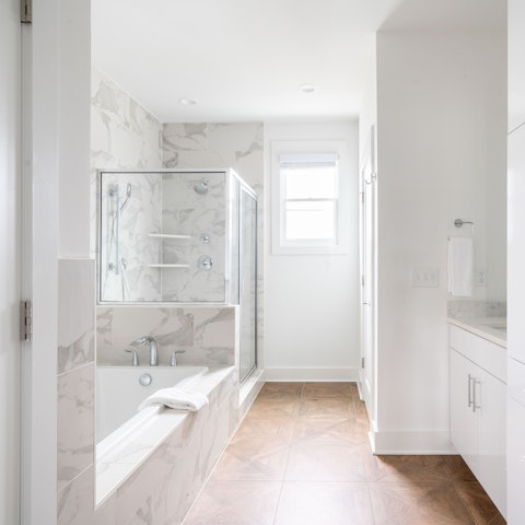 Treat yourself to a rejuvenating soak in the soothing bathtub