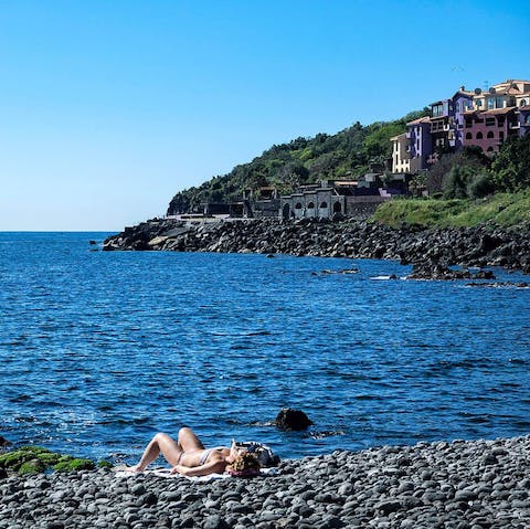 Pick your way down to the coast below Acireale