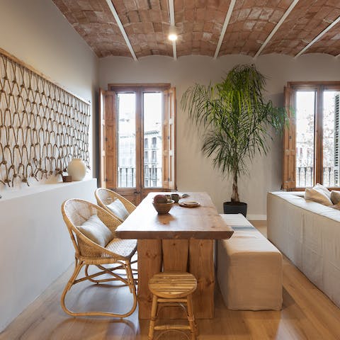 Sit down to a celebratory meal in the bright dining area