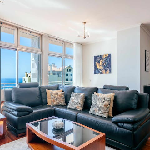 Spend quiet evenings curled up on the squashy leather sofa