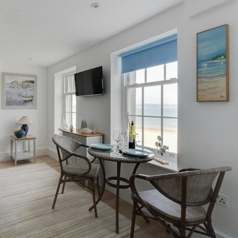 Enjoy a glass of wine while admiring the coastal views