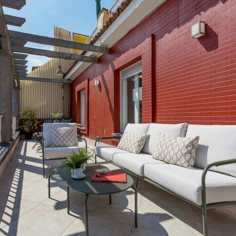 Unwind with drinks in the sun on the private terrace