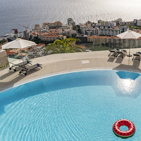 Swim and sunbathe with stunning sea views
