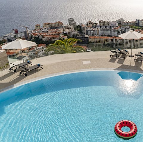 Swim and sunbathe with stunning sea views