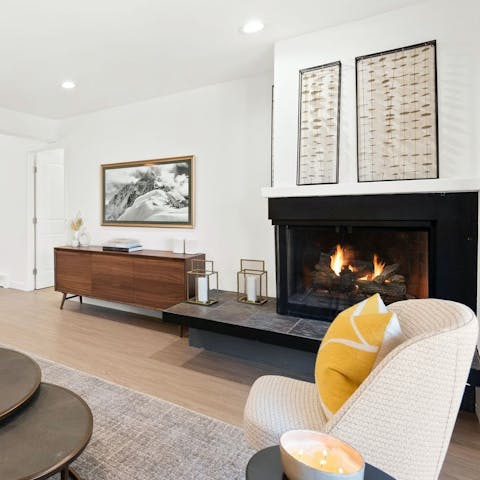 Cosy up with a hot chocolate in front of the fireplace