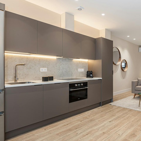 Fire up the coffee pod machine in the sleek kitchen