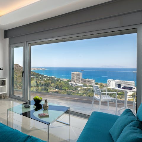 Lounge on the sofa while taking in the beautiful sea views