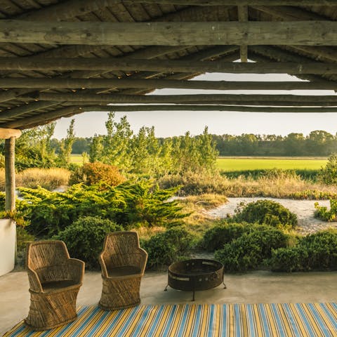 Enjoy your morning coffee on the wicker chairs, taking in the view and listening to the birds chirp