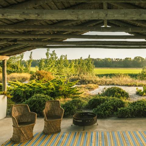 Enjoy your morning coffee on the wicker chairs, taking in the view and listening to the birds chirp