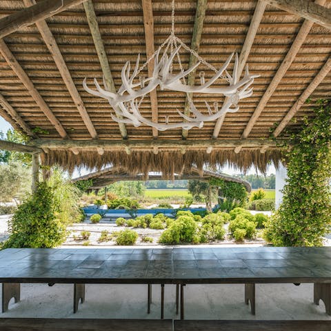 Gather around the picnic-style dining table for relaxed barbecue dinners at home