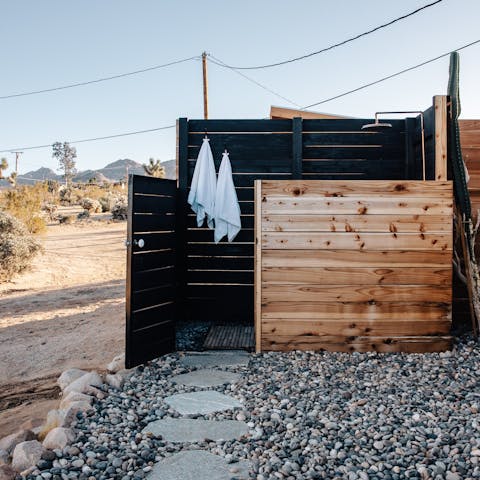 Freshen up in the outdoor rain shower