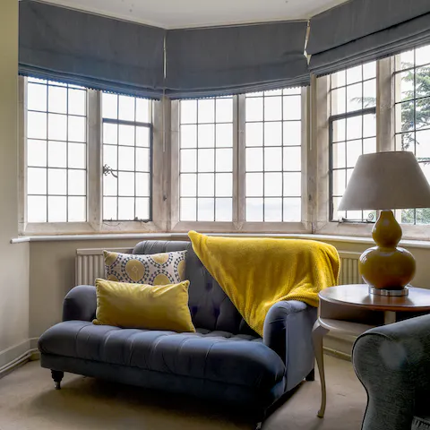 Sneak away with a good book to one of the home's many quiet nooks