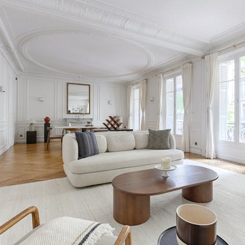 Have a glass of Champagne in the impressive living room