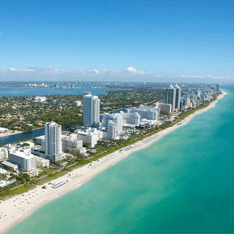 Drive half an hour to the majestic Miami Beach