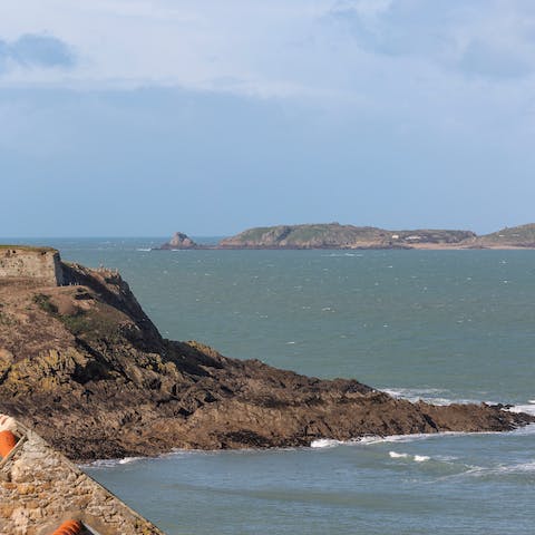 Spend days riding the waves off Bon Secours Beach, just steps away from your home