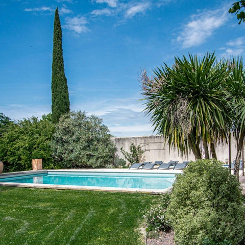 Spend a day relaxing by the pool and dine beneath the shade of the centuries-old lime tree