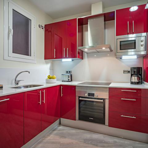 Try your hand at a Catalan recipe in the bright red kitchen