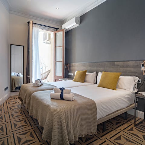 Head out onto the bedroom's balcony as soon as you wake up