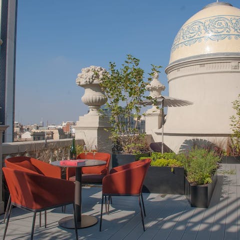 Gather together for sundowners on your private rooftop terrace