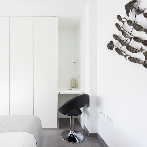 Catch up on work at the main bedroom's desk space