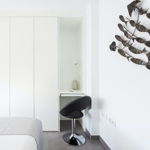 Catch up on work at the main bedroom's desk space