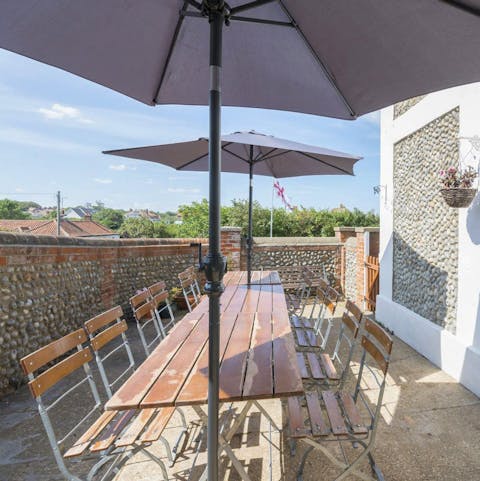Dine alfresco at the cobbled patio dining area