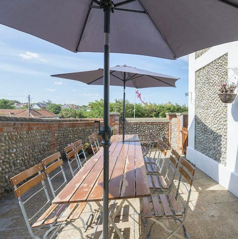 Dine alfresco at the cobbled patio dining area