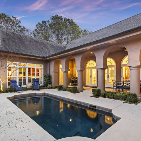 Take a dip in the heated pool or soak up the sun on a lounger